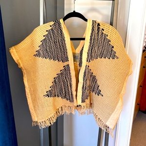 Super cool handmade Cambodian Vest in black and camel.